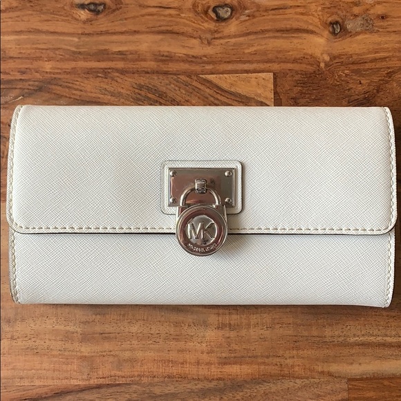 Michael Kors Handbags - Michael Kors white large wallet/clutch